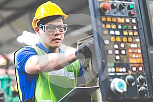 Electrician Engineers repairing machinery in industrial plants. worker Working at the Heavy Industry Manufacturing Facility