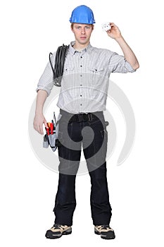 Electrician holding cable