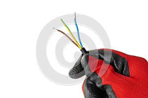 Electrician holding the ends of an electrical cable