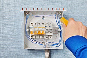 Electrician install a fusebox or circuit breakers