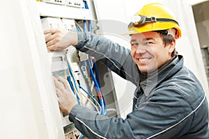 Electrician installing energy saving meter