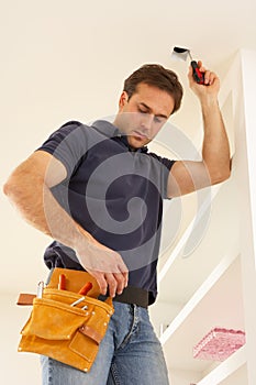 Electrician Installing Light Fitting