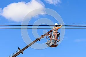 Electrician installing new power lines. photo