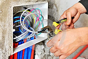 Electrician installing a switch socket