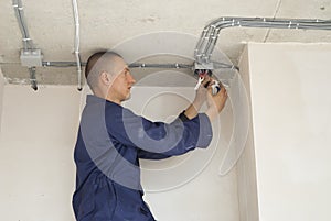 Electrician insulates wires