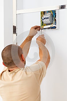 Electrician Man Fixing Fuse
