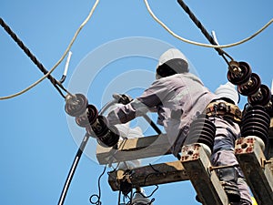 Electrician man working at height and dangerous