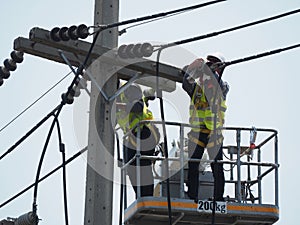 Electrician man working at height and dangerous