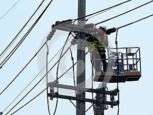 electrician man working at height and dangerous