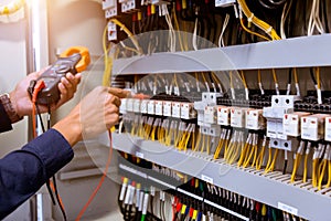 Electrician measurements with multimeter testing current electric