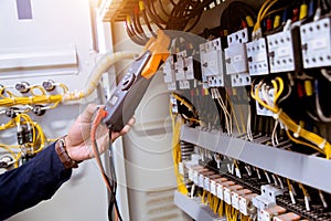 Electrician measurements with multimeter testing current electric