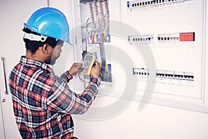 Electrician multimeter, electric switch box and man test cable system, wiring or measure voltage power supply. Quality