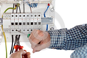 Electrician is repairing an electrical circuit