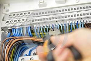 Electrician repairing faulty wiring