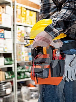 Electrician in the store of electrical components. Electricity