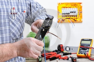 Electrician technician at work on a residential electric system