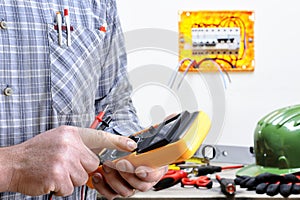 Electrician technician at work on a residential electric system
