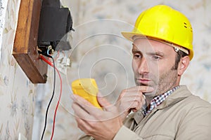 electrician technician at work on residential electrical panel