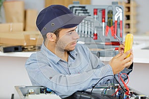 electrician technician at work on residential electrical panel