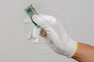 Electrician wear the antistatic gloves photo