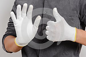 Electrician wear the antistatic gloves photo