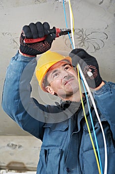 Electrician at wiring work