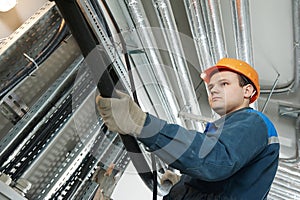 Electrician worker at cabling