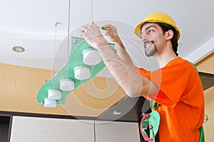 Electrician working on cabling