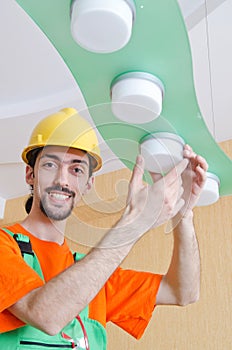 Electrician working on cabling