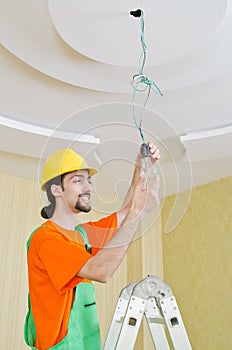 Electrician working on cabling