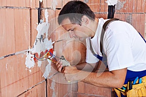 Electrician working on electrical installation