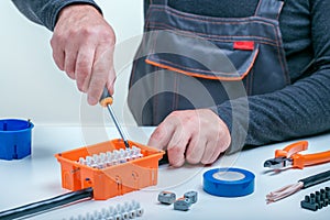 Electrician Working on Electrical Panel
