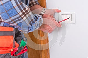 Electrician working in the electrical plant.