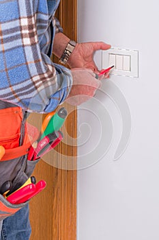 Electrician working in the electrical plant.