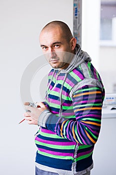 Electrician working with wires and other utensils