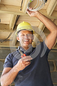 Electrician Working On Wiring