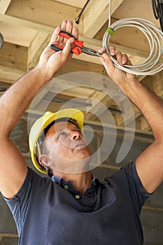 Electrician Working On Wiring