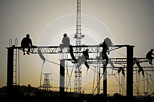 Electrical workers on electrified lines photo