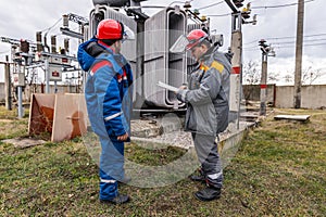 Electricians at the substation