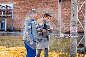 Electricians at the substation