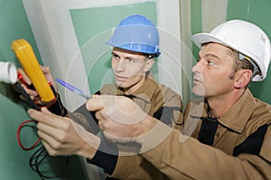 Electricians wiring new house