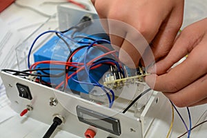 Electricians working on a power supply