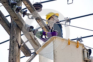 Electricians working to repair the power line