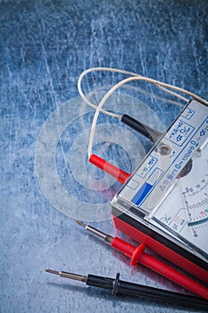 ElectricianÂ’s multimeter on scratched metallic surface construct