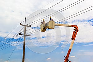 Electricity Authority on cable car to maintenance a electric cab