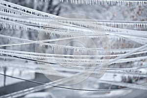Electricity cables covered in ice after frozen rain