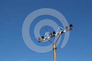 Electricity column and a blue sky