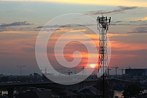 Electricity and communiction network wire on sunset background in the evening