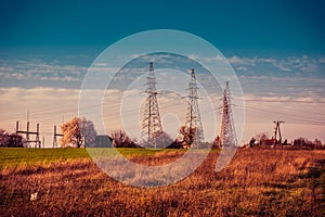 Electricity in the countryside, in the light of the morning sun.