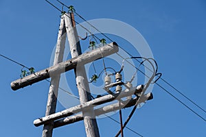 Electricity distribution, high-voltage power pole with wires on insulators